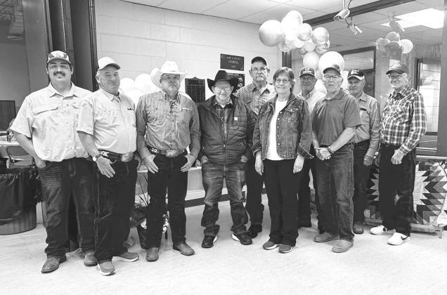 Dewey County Highway Dept. Secretary Cathy Lemburg was honored at a retirement party at Timber Lake on June 19. She was presented with a star quilt and other gifts by county employees, friends and family. Pictured above are present and former county highway department crew members. FRONT (l-r): Highway Supt. Will Wiedmer, Chuck Maher, Mitch Enright, Doc Pesicka, Cathy, Toby Reinbold; Back: Tom Hermes, Chip Long, John D. Boldt, and Lyle Richter. (More on page 6) Photo by Kathy Nelson