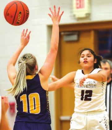 Timber Lake’s Cassie Carter passes to an open teammate.