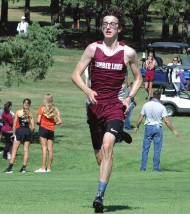 ABOVE RIGHT: Timber Lake’s Ian Beyer ran the LMC course in just over 19 minutes for fifth place overall in the varsity boys competition. Photo by Jon Flatland