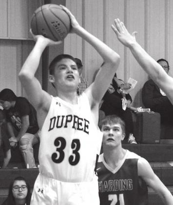 Dupree freshman Josh Morrison shoots for two points during the Tigers’ LMC game versus Harding County. Photo by Patty Peacock