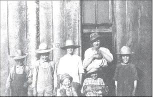 Chapel School about 1920. Front: Bud Caswell and Laura Chapel; Back: Louis Caswell, Ed Caswell, Mac Chapel, Margaret Caswell, and Florence Caswell.