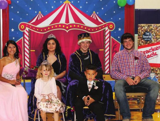 RIGHT: Queen Amiyah Bridwell and King Cinch Hebb with first runners-up Megan Hinrichs and Hunter Stambach and Elementary Princess Jersie Deal and Prince London Garreau