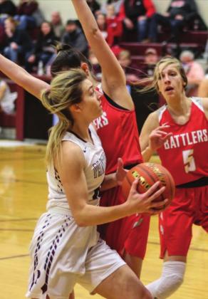 Shay Kraft powers through the Battler defense on her way to the hoop.