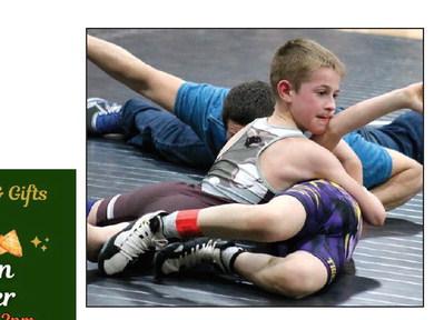 Crawford Maher of the Timber Lake Youth Wrestling Club tries to pin Kip Longbrake of Dupree during the Panther Invite last Thursday, March 1. Photos by Jon Flatland