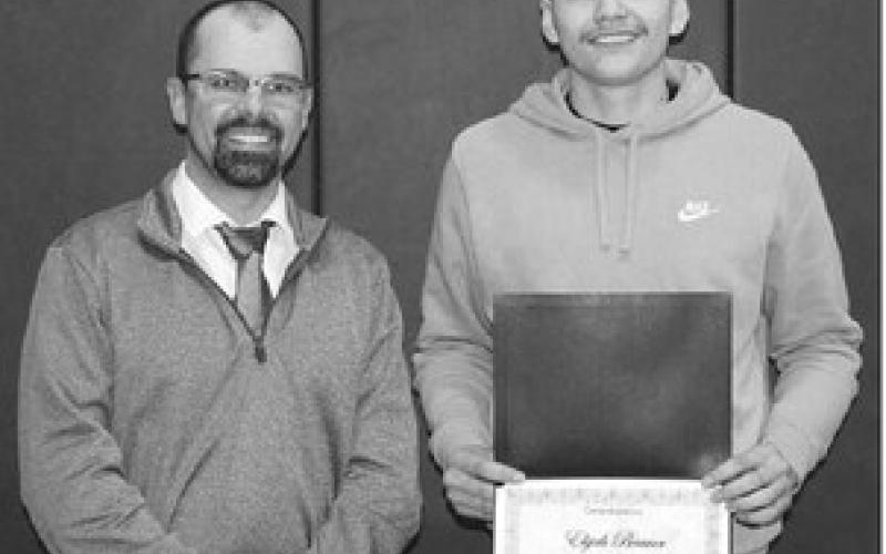 JJ Martin of Moreau-Grand Electric Co-op presented Elijah Brewer with a Moreau-Grand Directors’ Scholarship.