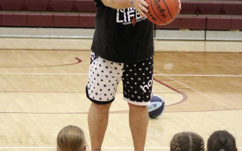 John “Sarge” Siers led a basketball camp for players of all ages at the Timber Lake School recently with dozens of kids attending. Siers is a teacher and head basketball coach at Ocoee High School in Florida who has coached at all levels and conducted youth basketball camps across the U.S. for more than 40 years. Photo by Jon Flatland