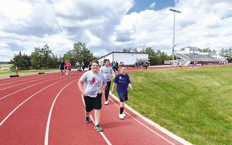 Blue skies welcomed walkers at Doug Kraft Field for the Middle School Cancer Walk on May 9.