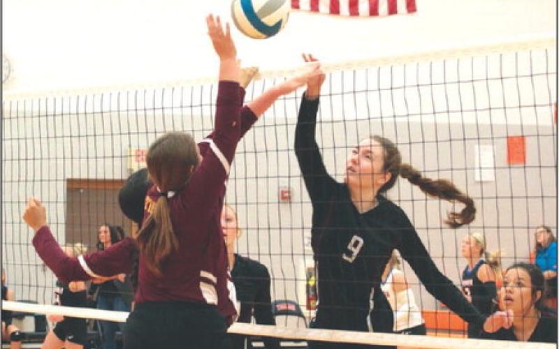 Battle at the Net Timber Lake’s Sara Holzer (9) battles an unidentified McIntosh player at the net during the Mobridge-Pollock Volleyball Invitational held Saturday, Sept. 9, at Mobridge-Pollock High School. The Panthers finished the day going 2-2 and moved their overall record to 4-5 on the season. Photo by Jon Flatland