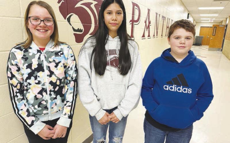 Sixth graders L-R: Maya Biegler and Autym Red Bear (winners) and Nathaniel O’Bryan (alternate).