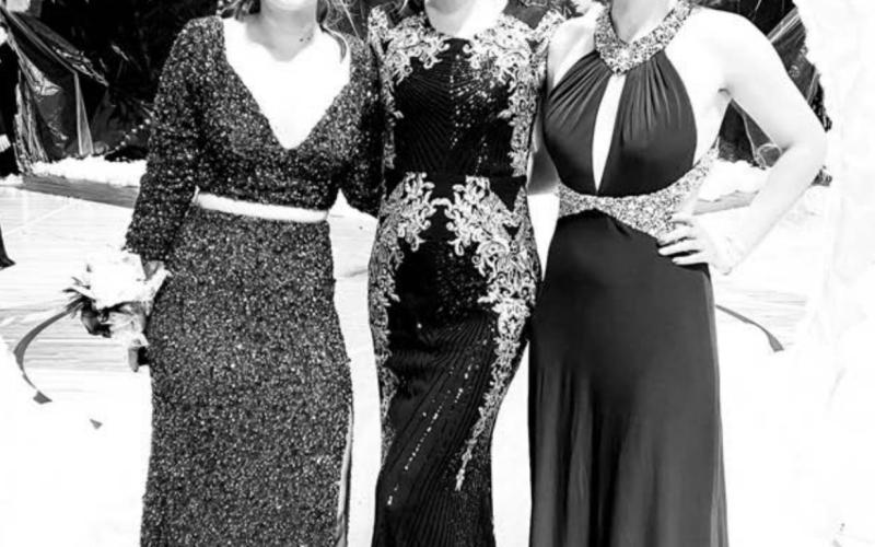 Manuela Molinera Munoz (LEFT) and Zoe Crassard (RIGHT) with Natalie Biegler at the TLHS prom.