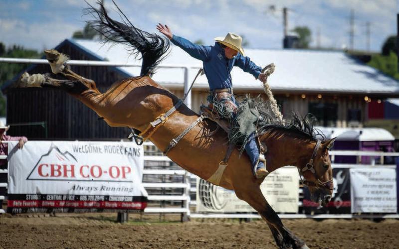 Jake Kammerer of Philip scored a nice ride in the saddle bronc event in Ft. Pierre recently and is expected to be among the area’s top talent to turn out for the Days of 1910 Rodeo in Timber Lake next weekend. Photo by Chuck Miner