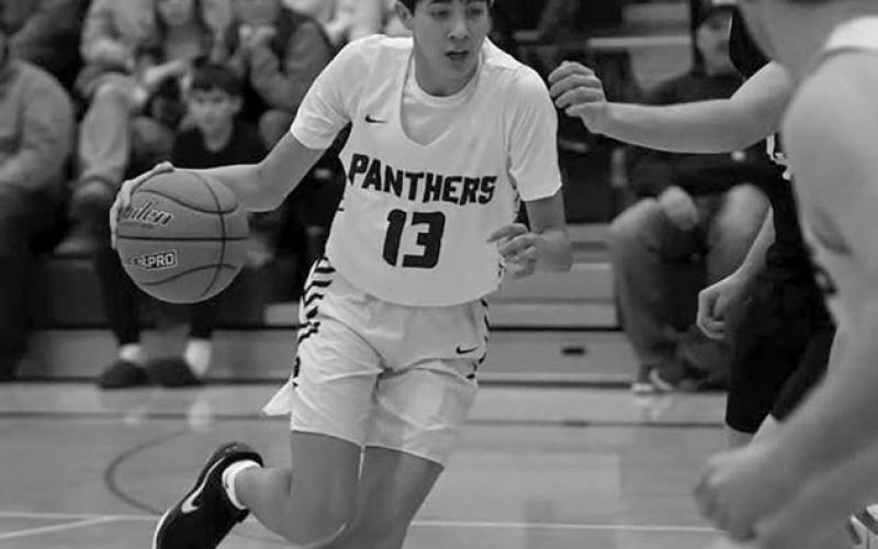 Freshman guard Jackson Bigger penetrates the lane during boys basketball action against Ipswich on Saturday. Timber Lake beat the Tigers and North Central last week to improve to 3-2 on the season. Photo by Marie DuPreez