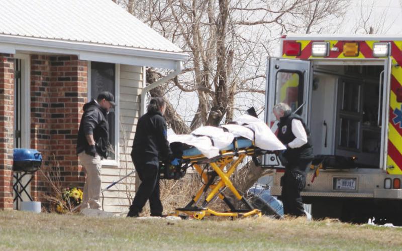 Emergency Medical Technicians remove the body of 25-year-old Eden One Feather of Little Eagle from House 449 on D Street in Timber Lake last Friday, April 14. Authorities discovered One Feather’s body after being dispatched to the residence for an unresponsive female. The FBI has taken over the case and No charges or names of two individuals taken into custody at the residence have been released by law enforcement or the U.S. Attorney’s Office. Photo by Jon Flatland