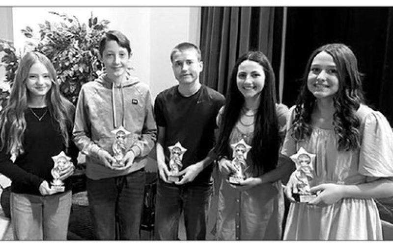 Timber Lake Middle School students who earned a 4.0 (A) average for the 2022-23 school year received trophies at Awards Day on May 3. L-R are Grade 6 - Marcella Handeland; Grade 7 - Landen Bieber; and Grade 8 - Thomas Holzer, Ruby Maher and Jaylee Schoelerman.