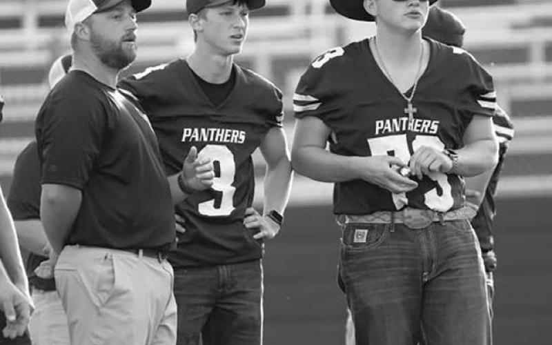 Braylen Hansen (73) watches the Panthers in action from the bench, where he has gone from player to coach. Photo by Marie DuPreez