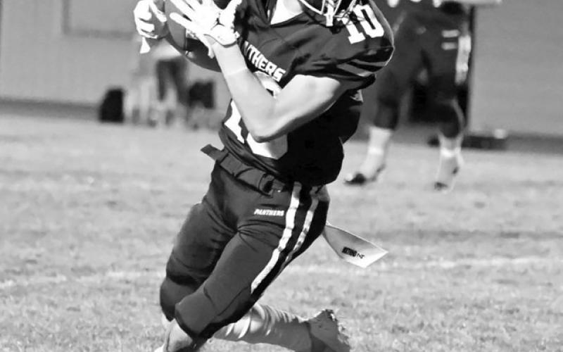 Photo by Marie Du Preez Panther wide receiver Gavin Farlee pulls in a pass from Cole Ducheneaux and heads up field for what would be a 16-yard touchdown catch and run. Farlee finished the night with six receptions for 116 yards.