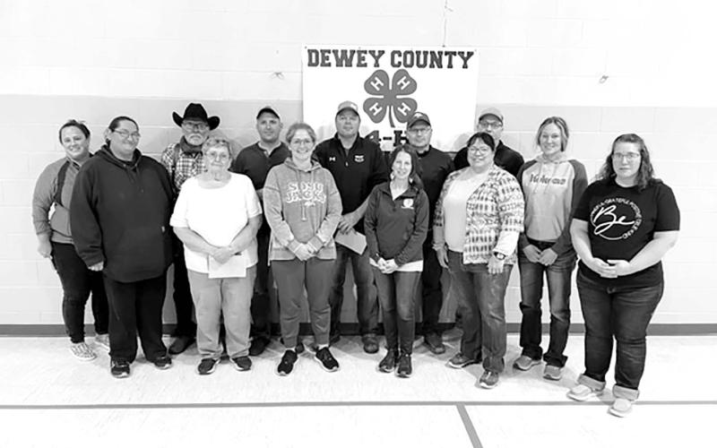 “It takes a village” comes to mind when speaking of keeping 4-H youth programs going. These volunteers were recognized at the annual Dewey County 4-H Awards supper on January 8. FRONT (L-R): Jackie Ridl, Sue Pederson, Karyl Boldt, Kristen Gill, Lisa Pederson, Denise Perryman; BACK: Jeri Ann Vines, Gary Pederson, Bo Biegler, Chad Boldt, Bryan Gill, Chad Pederson, and Mandy Locken. Photo by Kathy Nelson