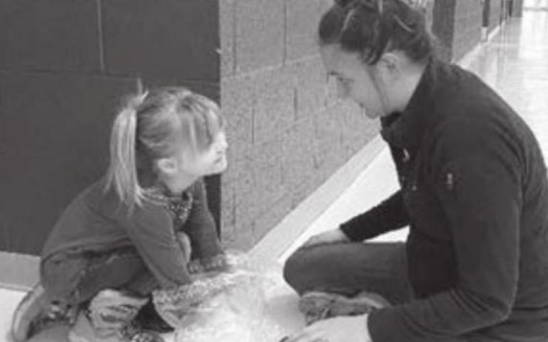 STUDENTS AT WOR