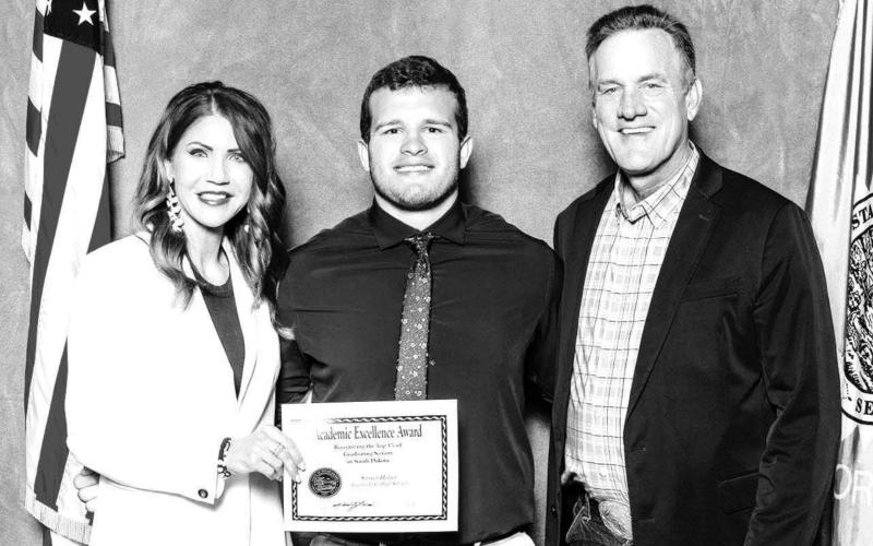 Timber Lake High School’s top senior, Sawyer Holzer, with Gov. Kristi Noem and Lt. Gov. Larry Rhoden