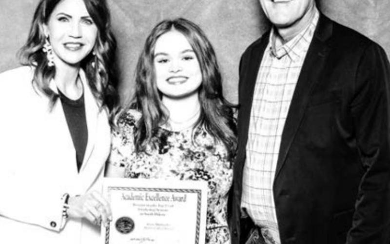 Top McIntosh senior, Irian Mittleider, with Gov. Kristi Noem and Lt. Gov. Larry Rhoden