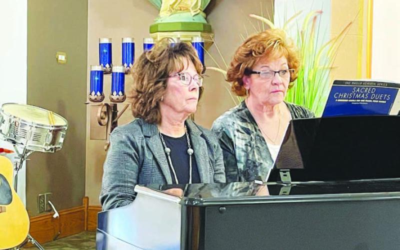 Cheryl Lawrence and Cindy Biegler played a piano duet.