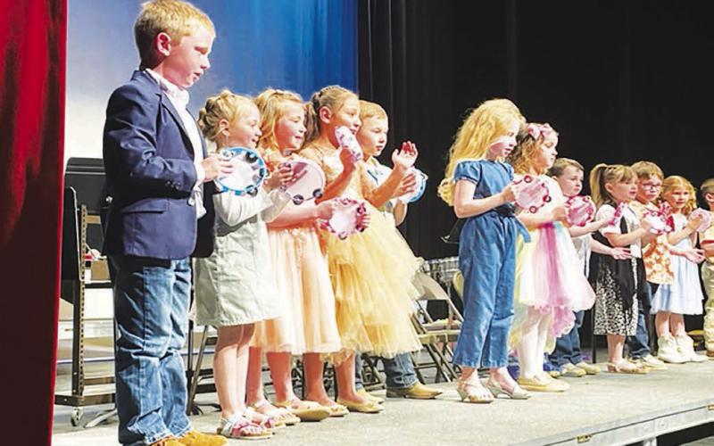 The Timber Lake Elementary School’s spring concert last Thursday (April 13) included the Kindergarten class performing “Tambourine Kid.” Besides the Kindergarteners tambourines, the audience was treated to recorder and ukulele music as well. Photo by Kathy Nelson