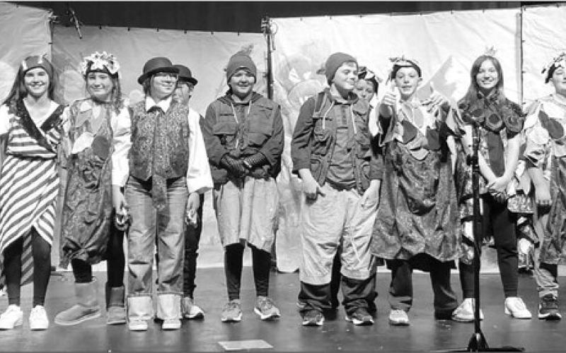 AT RIGHT: The Forest Creatures. L-R: Jiel Mowrer, Kylie Lawrence, Jalee Booth, Selena Longbrake, Ben Peterson, Katie Ridl, Thomas O’Bryan, Trent Russell, Michael Bollinger, Pazlin Ducheneaux, Baylor Bickel, and Cody Russell.