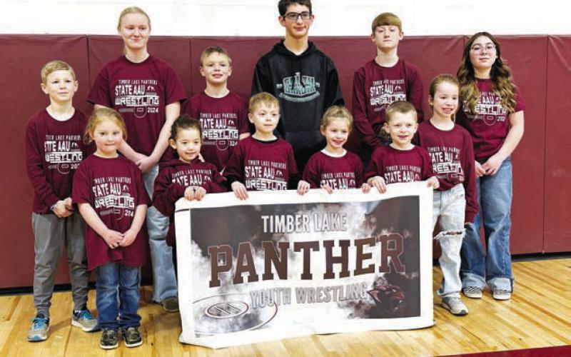 Timber Lake wrestlers who qualified for the State AAU tournament. FRONT, l-r:Lyllian Tesch, Ramzi Veit, Ryder Spiel, Rowan Maher, Trevor Aberle, Elizabeth Keller; BACK: TK Paxton, Emily Gill, Keaton Jones, Levi Berndt, Taggen Paxton, Selena Longbrake. Photo by Kathy Nelson