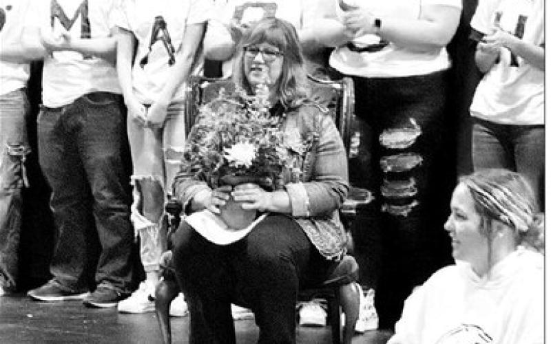 Students and staff at Timber Lake School celebrated their principals on Wednesday, May 1 with Principal Appreciation Day. Elementary students honored Principal Danae Paxton (LEFT) with drawings and messages on the wall. The Middle School and High School surprised their principal, Julie Marshall (RIGHT), with an assembly program which included music, speeches, flowers and some dancing.