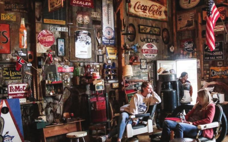Two young ladies visit in “antique heaven” during a break in the action Saturday.