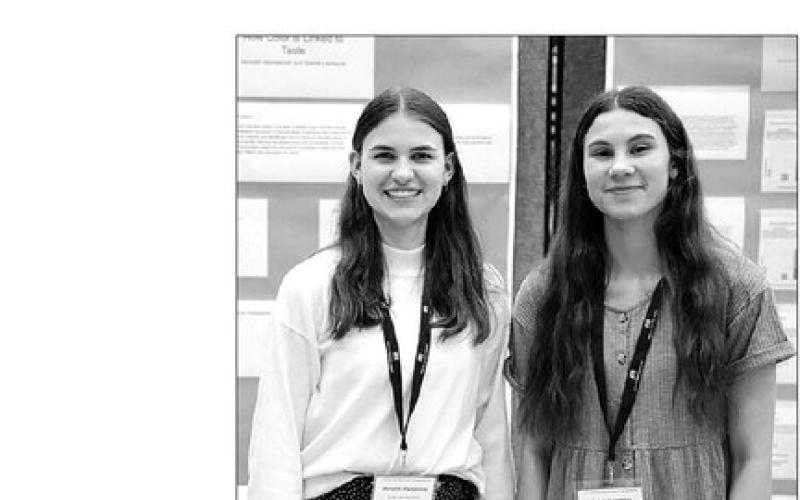 ABOVE: Meredith Maciejewski and Natalie Lawrence won first place in the Social Sciences Category.