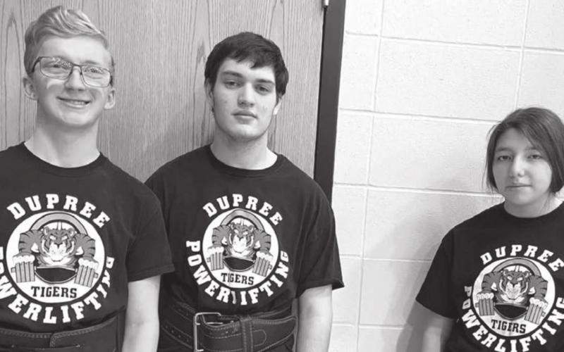 Three members of the Dupree HS powerlifting team traveled to competition in Brandon Valley on Saturday, Jan. 29, included (l-r) Case DePoy, Matthew Lemke and Nevaeh Farlee. Farlee was the lone medalist for the team, finishing second overall in the girls’ 7th Division weight class. Photo by Patty Peacock