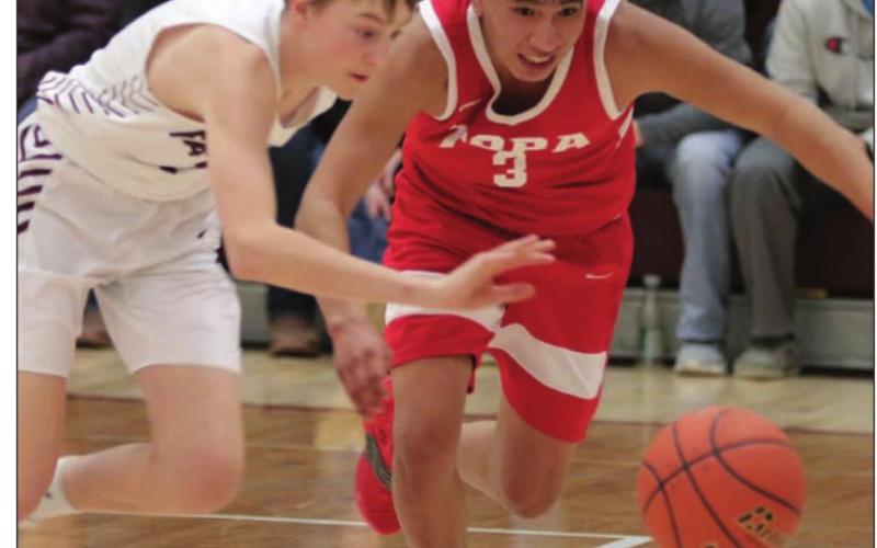 Timber Lake’s Kyler Bollinger (LEFT) and Tiospaye Topa’s AJ Begay race each other to the ball during their Region 8B tournament matchup last week. The Panthers defeated the Hawks to advance. Photo by Jon Flatland