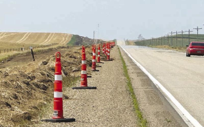 Cones along portions of the route of the new N63 project indicate locations where the line is being placed in the state right-of-way on Highway 20 west of Timber Lake.