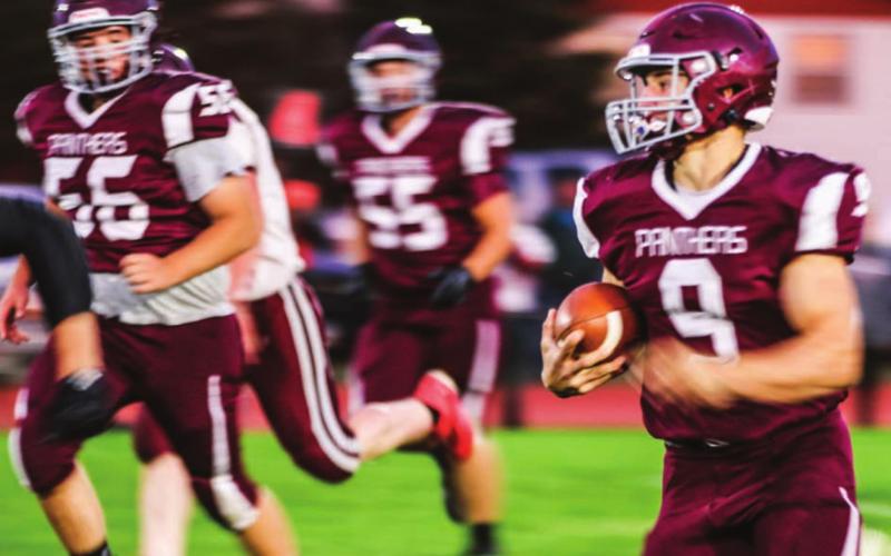 Panther senior Hank Kraft and the TL offensive line, including Dan Peterson (56) and AJ Lindskov (55), racked up the rushing offense against Newell in their homecoming game victory last Friday.