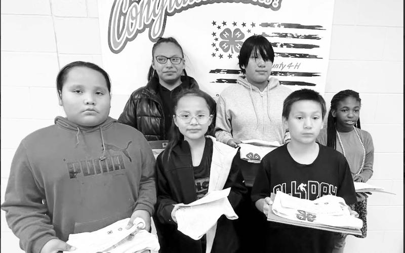 Kountry Kuzzins 4-H Club Front Row (L-R): Delonte Spotted Horse, Leta Spotted Horse, and Joshua Brown Thunder; Back Row: (L-R): Natellia Spotted Horse, Cicada Brown Thunder, and Norah Huber. Not pictured: Ezekiel Chasing Hawk, Xara Chasing Hawk, Jazmyn Hand Boy, Aubree Miner, Jackson Taylor, Raelynn Vines, and Andrew White Eagle.
