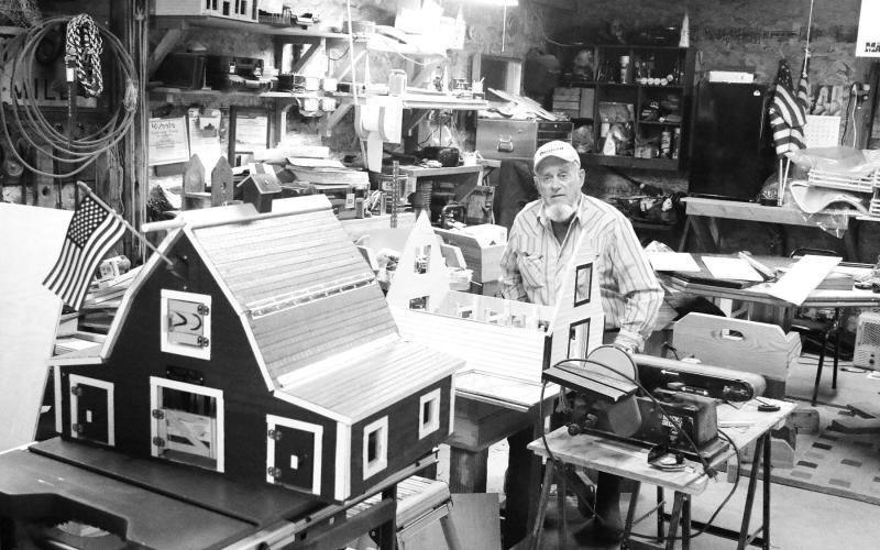 One piece at a time, Dave Doan crafts barns that will entertain kids for years.