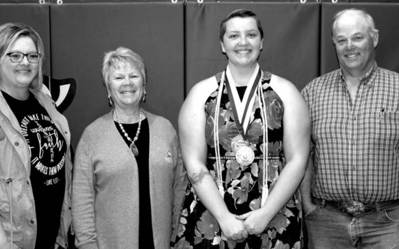 Malory Peacock (SECOND FROM RIGHT) with three of the scholarship presenters. L-R: Robyn DePoy presented her the $500 DHS Alumni Scholarship, Melissa Maher presented the $1000 Moreau Grand Scholarship, and Doug Young presented her with the $500 Vicki Young Memorial Scholarship.
