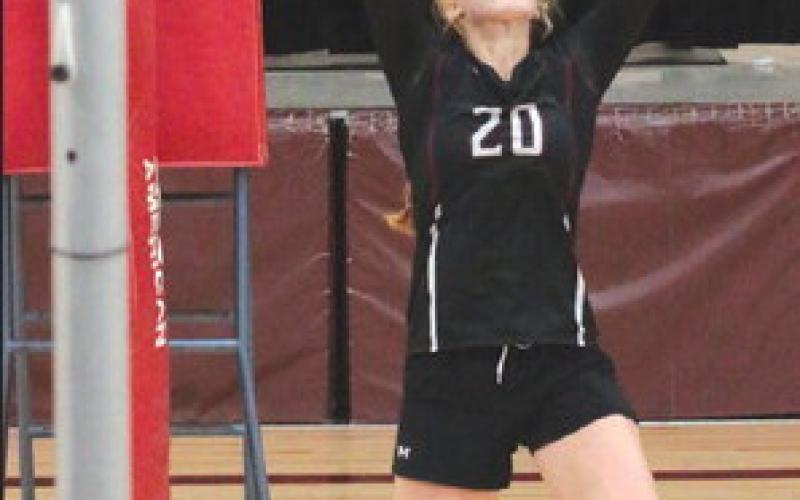 Senior Kendyl Locken of Timber Lake sets a shot for one of her hitters during the Lady Panthers match against Dupree in the Little Moreau Conference Volleyball Tournament on Saturday, Sept. 23. Photo by Jon Flatland