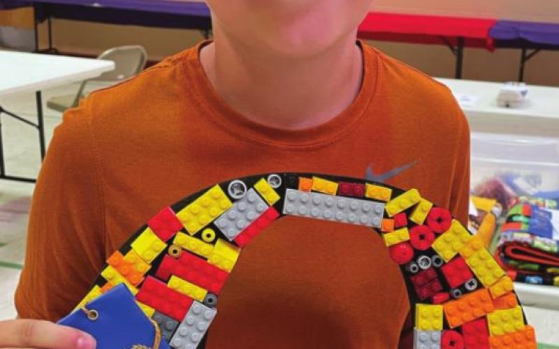 Owen Schweitzer’s Lego wreath won a blue ribbon in the open class.