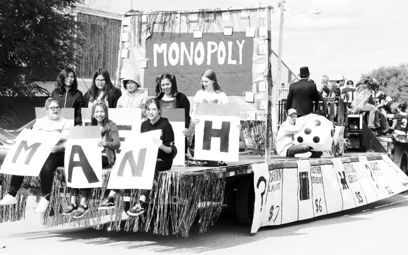 Wyatt Lemke WAS the Monopoly Man character this week! He had that part in the skit and was a key part of the ninth graders outstanding Monopoly themed parade float that took first place in the 7th-9th grade division.