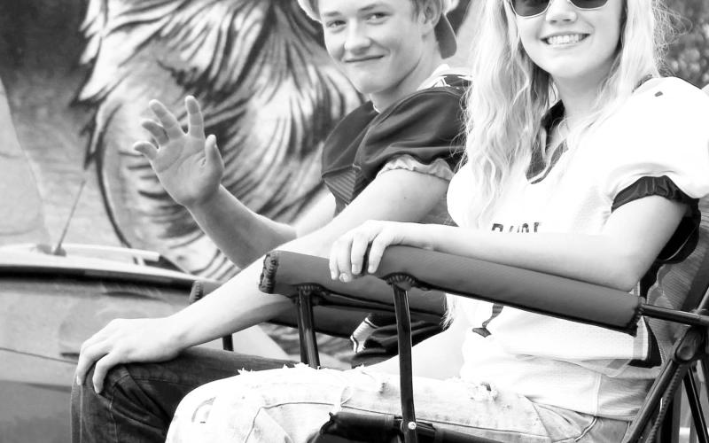 Dupree High School Royalty, Treg Thorstenson and Kennedy McLellan, enjoying their royal ride down main street as they welcomed everyone to the DHS Homecoming Parade.