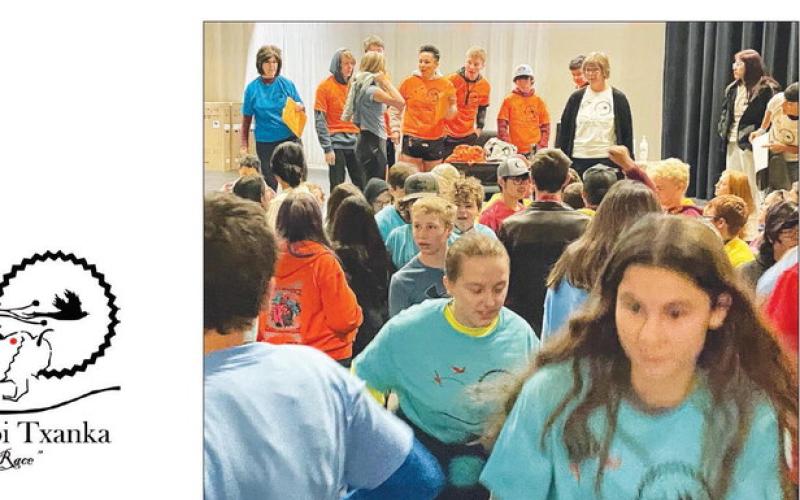 Middle and high school students took off from the theater after receiving their assigned T-shirts and leaders.