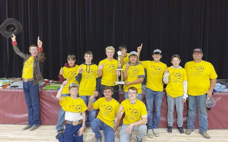 The middle school-high school team in the yellow shirts won the traveling trophy for “The Great Race.” Team members are FRONT (L-R): Taggen Paxton, Louis Scholtz, Gabe Keller; BACK: Kade Conner, Kanton Hunt, Treyden Beer, Brady Sandquist, Dayson Gutierrez, Tye Boldt, Aidan Rough Surface, Landen Bieber, and team leader Jayme Murray.