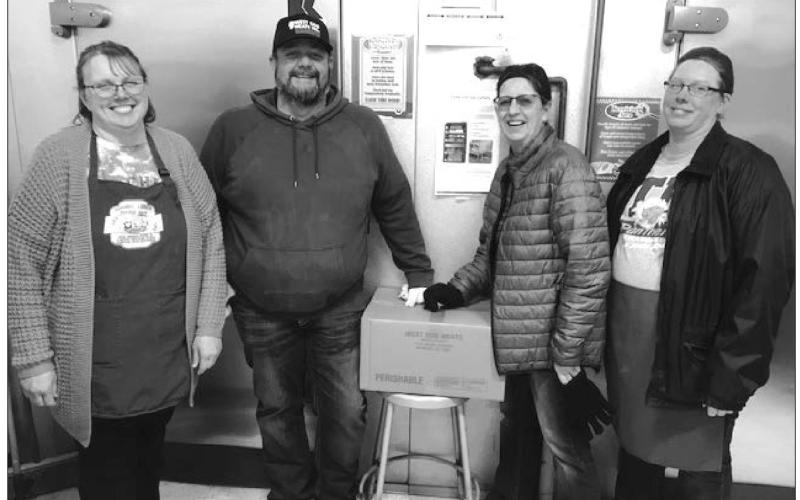 The Timber Lake School kitchen staff received the first shipment of donated beef from the Cheyenne River Farm to School program on March 4. L-R are Diane Goldade, Jayme Murray (irector of the Farm to School Program), Peg Ley, and Robin Hinsz. The beef was donated by Pat and Kasey Maher of Timber Lake.
