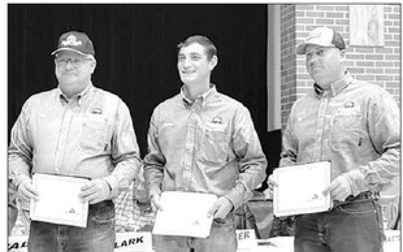 RIGHT: Employees receiving years-of-service awards were (L-R) Kent Larson (30 years), Hunter Smith (10 years), and Jace Vrooman (10 years).