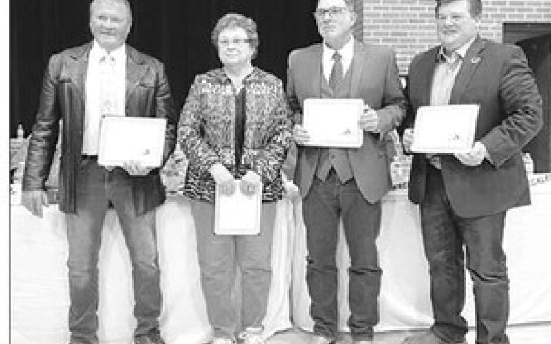 Board members who received awards for their years of service were (L-R) Royce Walker (30 years), Lois Bartlett (15 years), Kelly Landis (5 years), and Ryan Maher (5 years). Photos by Kathy Nelson
