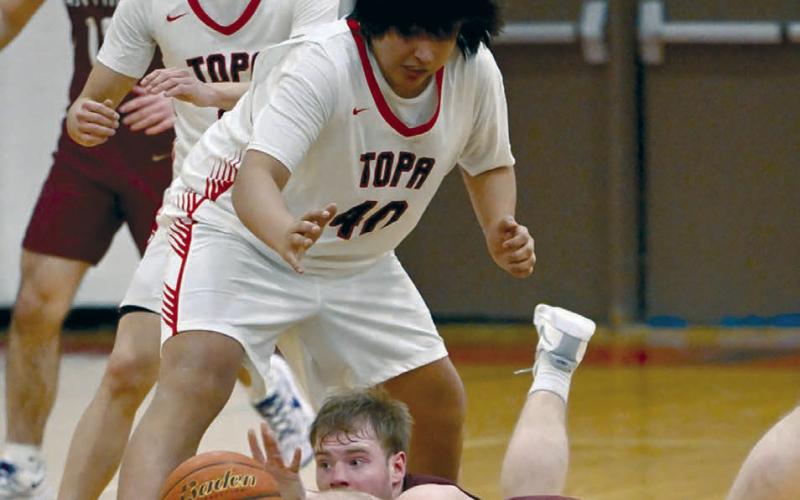Timber Lake Panther senior Treyton DuPreez dives for a loose ball in front of Tiospaye Topa’s Steven Garnette during boys hoops action on Saturday. The Panthers are 6-2 and riding a five-game win streak into meetings with Herreid-Selby on Thursday, Jan. 16, and winless Aberdeen Christian in Redfield on Saturday, Jan. 18. Find more sports on Pages 8-10 and 12. Photos by Marie DuPreez
