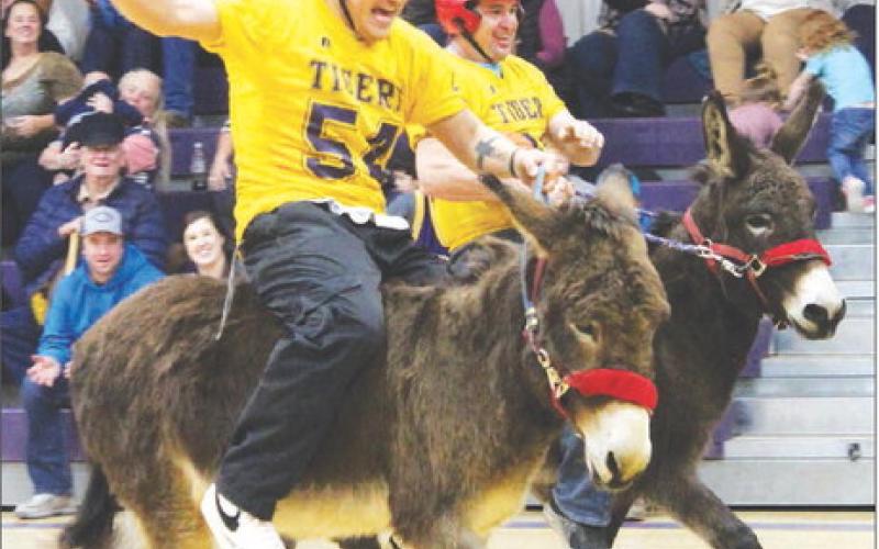 Dupree HS senior Bubba Marshall (left) screams commands to an uncooperative partner during a Donkey Basketball fundraiser presented by the DHS Post-Prom Committee last week. Photo by Patty Peacock