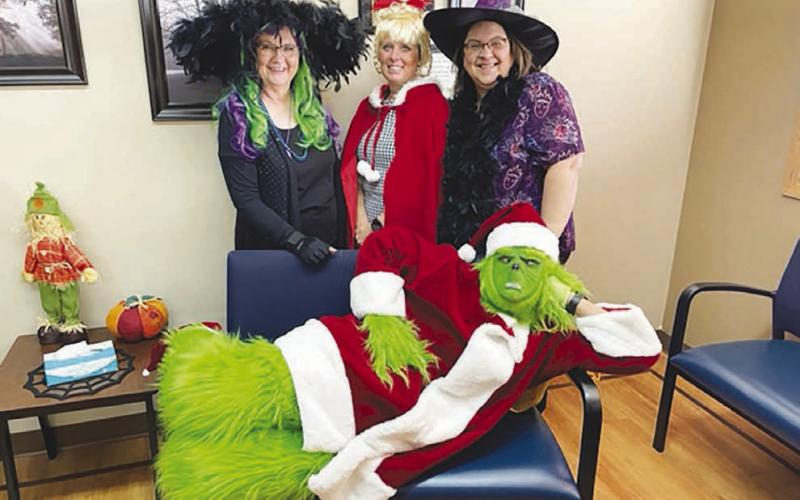 These characters greeted patients at West Dakota Health Center. FRONT: Rachel (The Grinch) Goldade; BACK: Kris Lawien, Candida Goehring, Holly Keller.